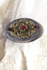 Oval Soapstone Paperweight with Ruby Stones