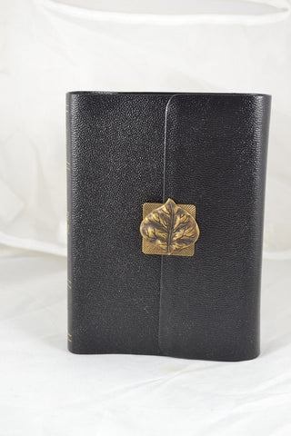KJV Compact Bible, Large Print, Black w/magnetic flap Turning over a leaf